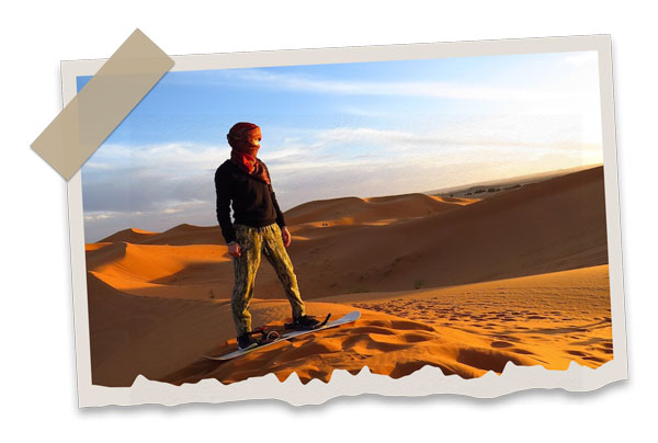 sandboarding-in-Merzouga-dunes Sunset Merzouga Camel Trekking